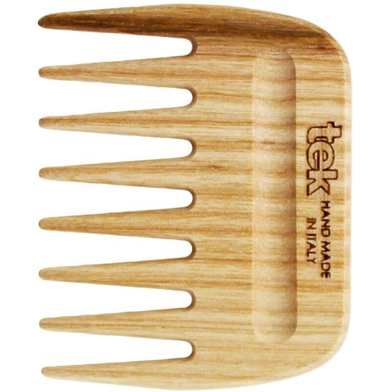 Peigne Afro à dents larges Tek pour démêlage de cheveux volumineux et soin du cuir chevelu.